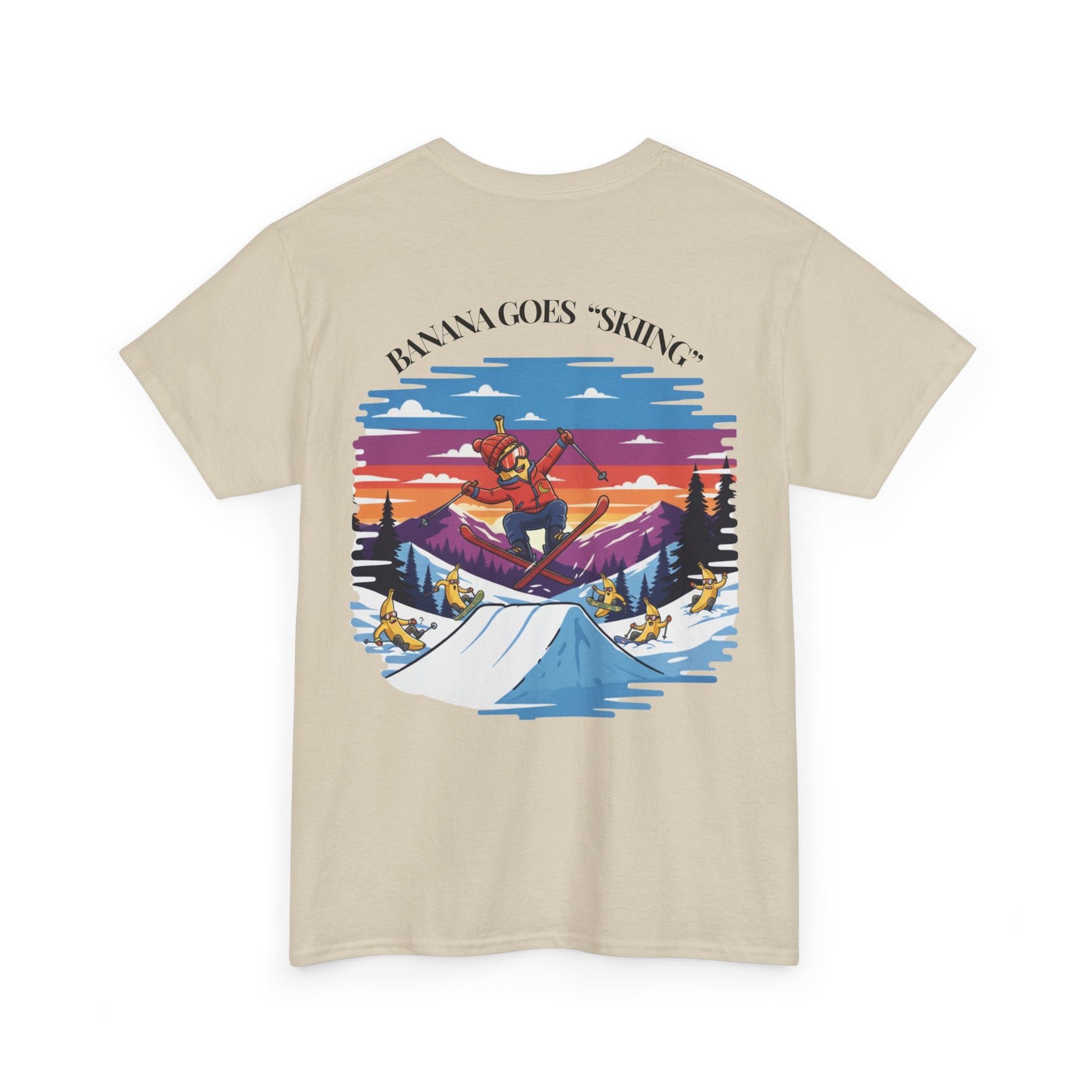 Beige t-shirt with a colorful graphic of a skier on a mountain and text 'Bama Goes Skiing' on the back.