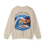 Beige sweatshirt with a colorful graphic of a dog surfing on a wave, palm trees, and the text 'Bunygoes Surfing'.