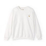 White sweatshirt with a small embroidered design on a white background
