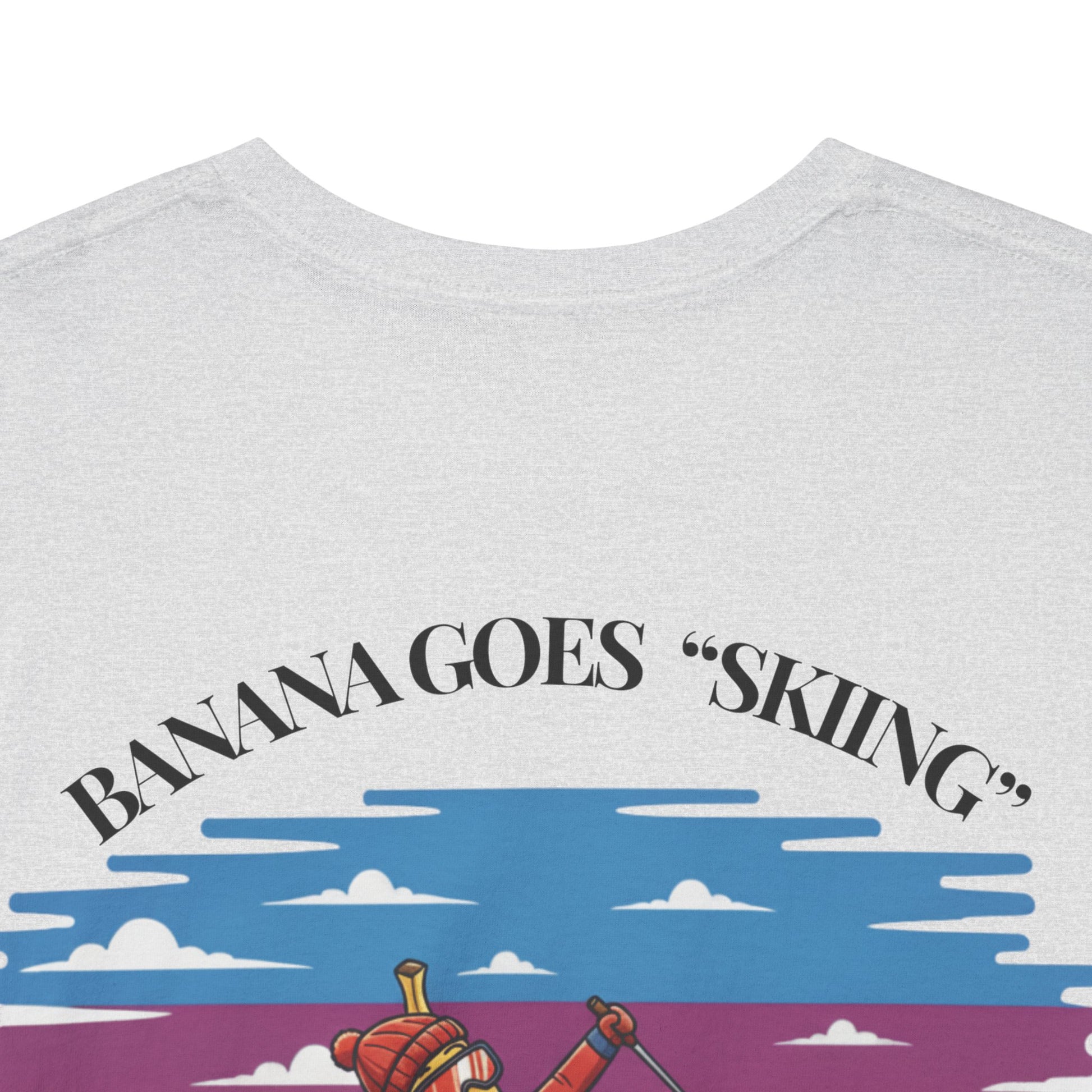 Gray t-shirt with 'Banana Goes Skiing' graphic design on a white background